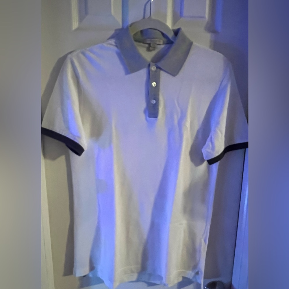 Burberry polo S white shirt.‎